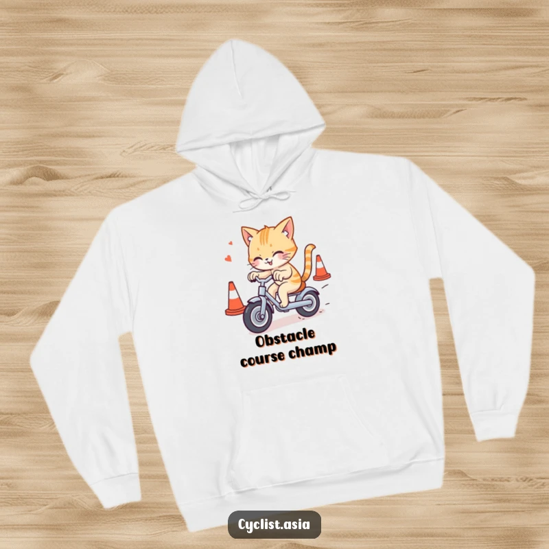 Funny cat hoodie featuring a mischievous cat weaving through traffic cones on a tricycle, offering warmth and a good chuckle.