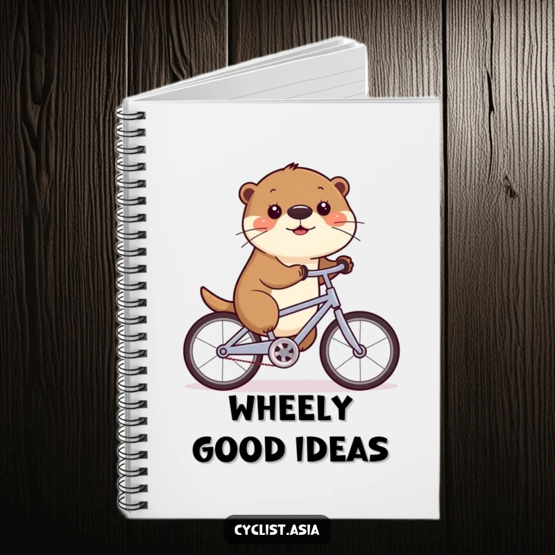 Funny notebook with a cute otter wiggling its nose while cycling, ideal for writing and sketching with a humorous touch.
