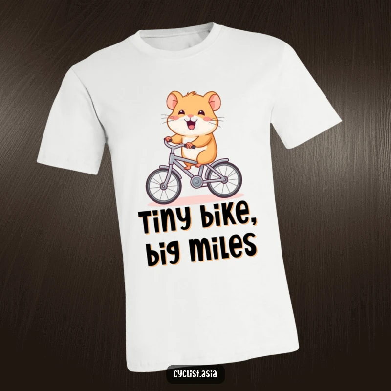 Funny hamster t-shirt, happy creature riding a tiny bicycle, humorous graphic tee, ideal funny gift.