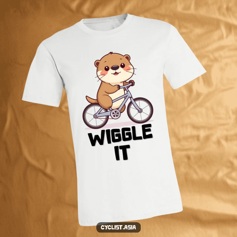 Funny t-shirt showcasing a cute otter wiggling its nose as it pedals a bicycle with a cheerful expression.