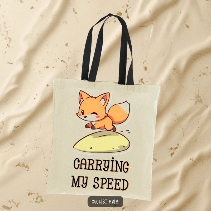 Funny tote bag showing a playful fox with wind in its tail, zooming downhill. Practical and fun for everyday use.