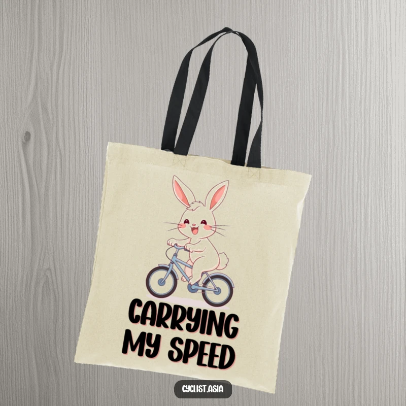 Funny Tote Bag: An energetic bunny with a joyful grin pedals a bicycle, symbolizing freedom and fun.